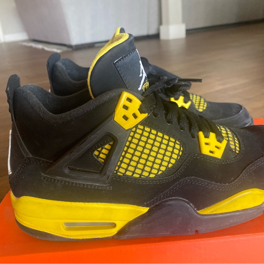 Nike Jordan 4 Retro Thunder 2023 Black and Yellow Sneakers